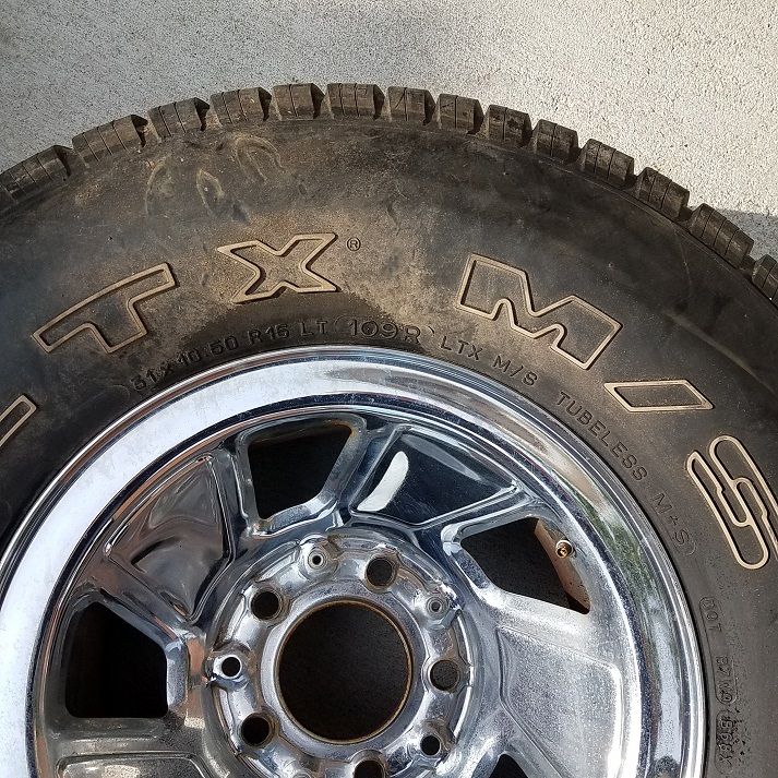 Michelin LTX M/S tire on a chrome 5-spoke wheel. Tire size 31x10.50 R15 LT 109R