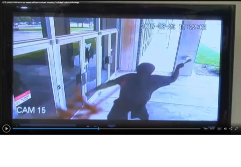 1995 Mercury Grand Marquis - Security camera footage captures a person breaking a glass door with an object.