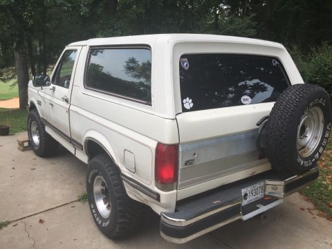 1988 Ford Bronco - This 1988 Ford Bronco is seen from the rear, a spare tire mounted on the tailgate and a South Carolina license plate.