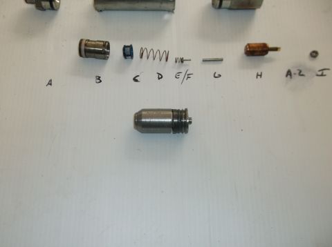 1979 Ford Ranchero - Carburetor parts laid out and labeled for identification and assembly reference.