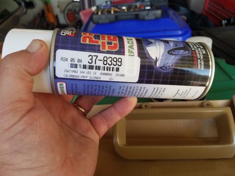 1994 Ford Bronco - Photo of a hand holding an aerosol can of ColorBond prep surface cleaner, part number 37-8399.