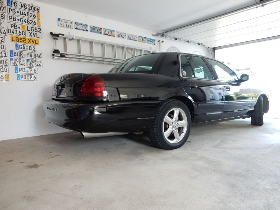 Black 2003 Mercury Marauder, rear 3/4 view
