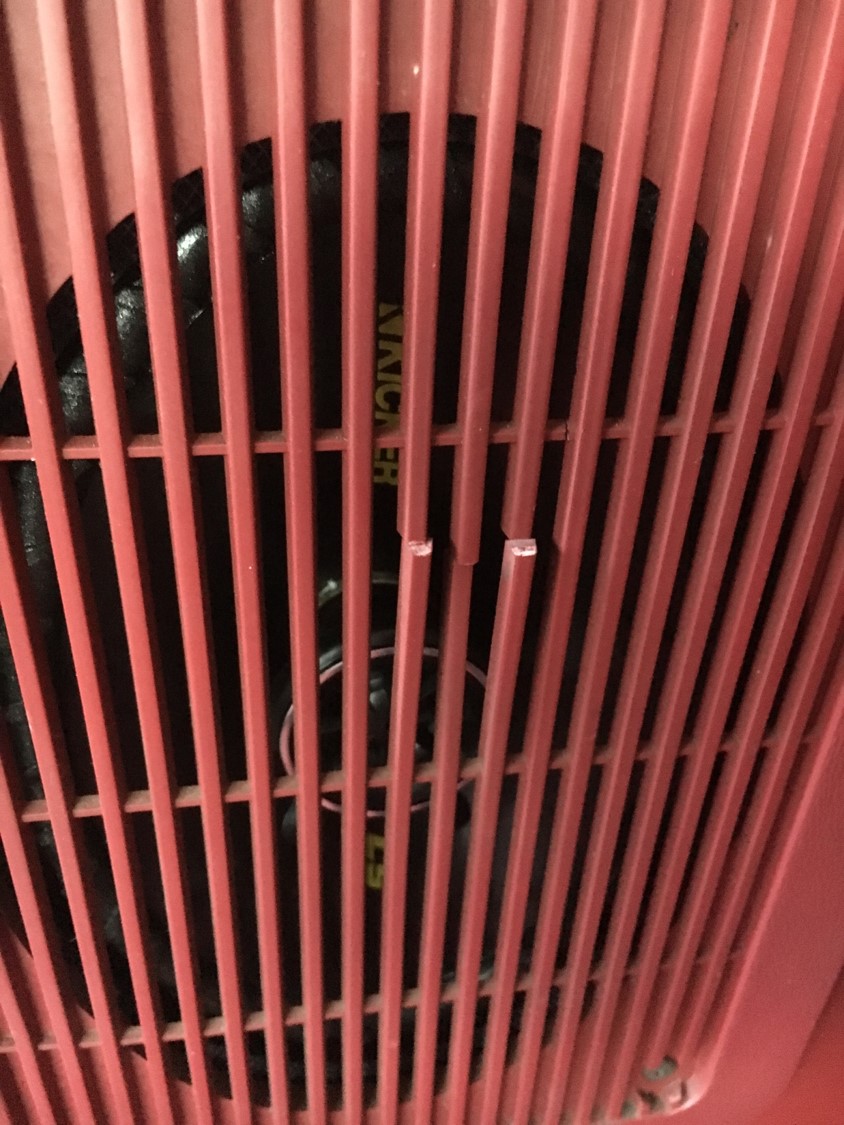 Red grille with visible text 'NAICHER' and 'SUPERMOTORS.NET' logo