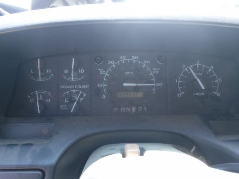 1996 Ford Bronco - Interior view of a vehicle's dashboard, displaying various gauges including the speedometer and tachometer.