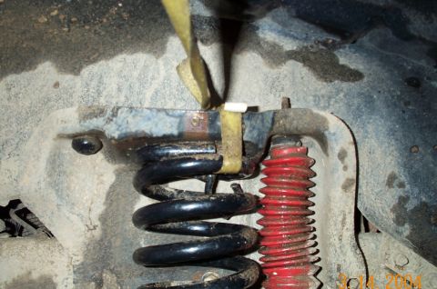 1986 Ford Bronco - Back woods engineering at it's best. This will hold the spring in the coil bucket.