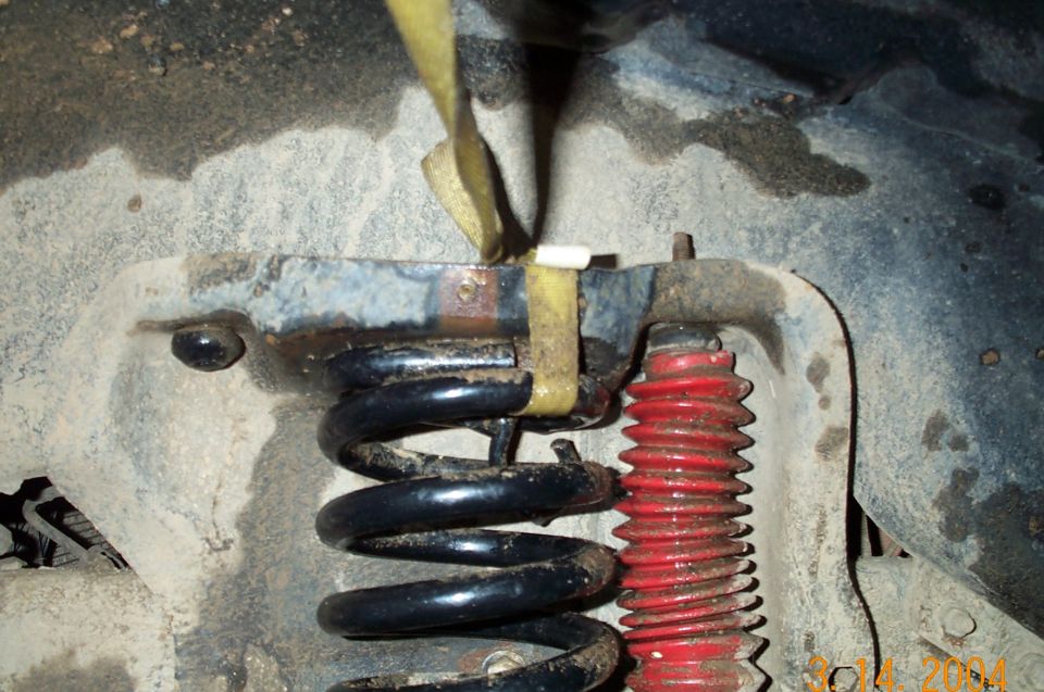 Back woods engineering at it's best.
This will hold the spring in the coil bucket.