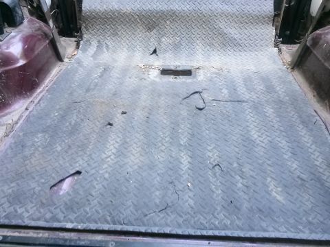 1996 Ford Bronco - The rear cargo area of a 1996 Ford Bronco features durable diamond plate flooring.