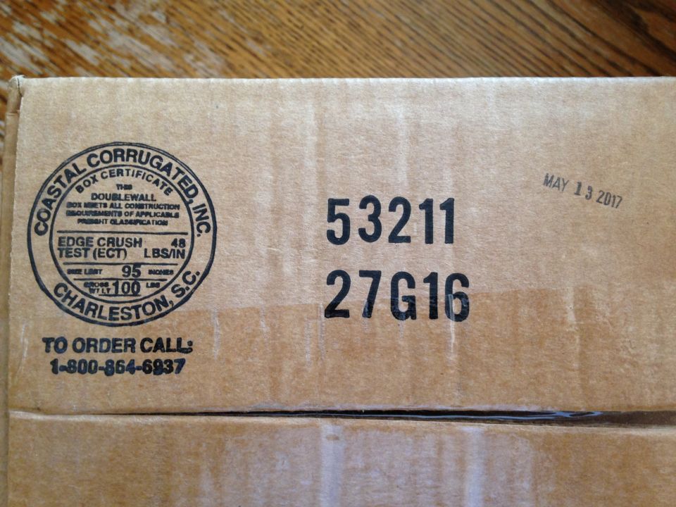 Cardboard box with Coastal Corrugated, Inc. stamp and shipping codes 53211 and 27G16. Date MAY 13 2017 stamped