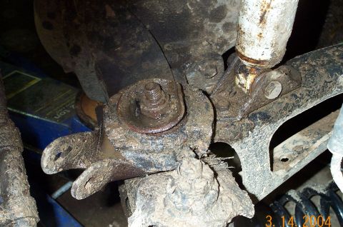1986 Ford Bronco - Bent Bottom Spring Retainer from spring jumping out.
