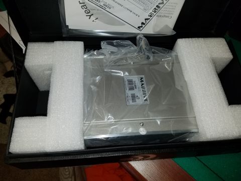 1994 Ford Bronco - A Massive stereo amplifier is shown packed in its original box with protective foam and paperwork.