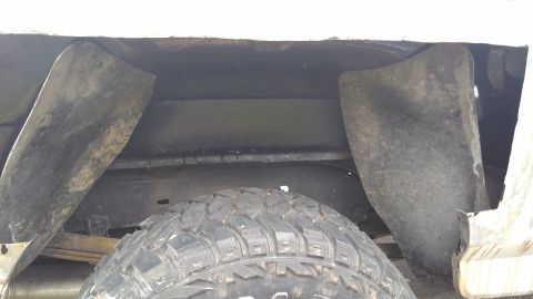1996 Ford Bronco - Instead of replacing the FID steel inner arch, I opted to just throw in the old plastic liners. It worked well to stop rocks and mud from k…