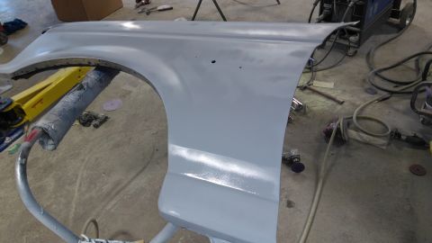 1996 Ford Bronco - After a bit of welding and body filler-ing, we took to priming the fenders and hood.