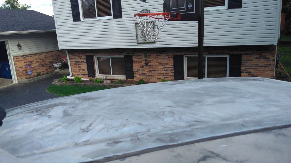 The hood had major clear coat failure, I can't find a picture but it was pretty much white before stripping.