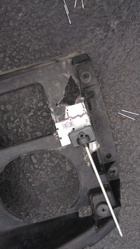 1996 Ford Bronco - The plastic header panel was very broken around the headlights. I fabbed up some sheet metal and riveted it on to give structure and a plac…