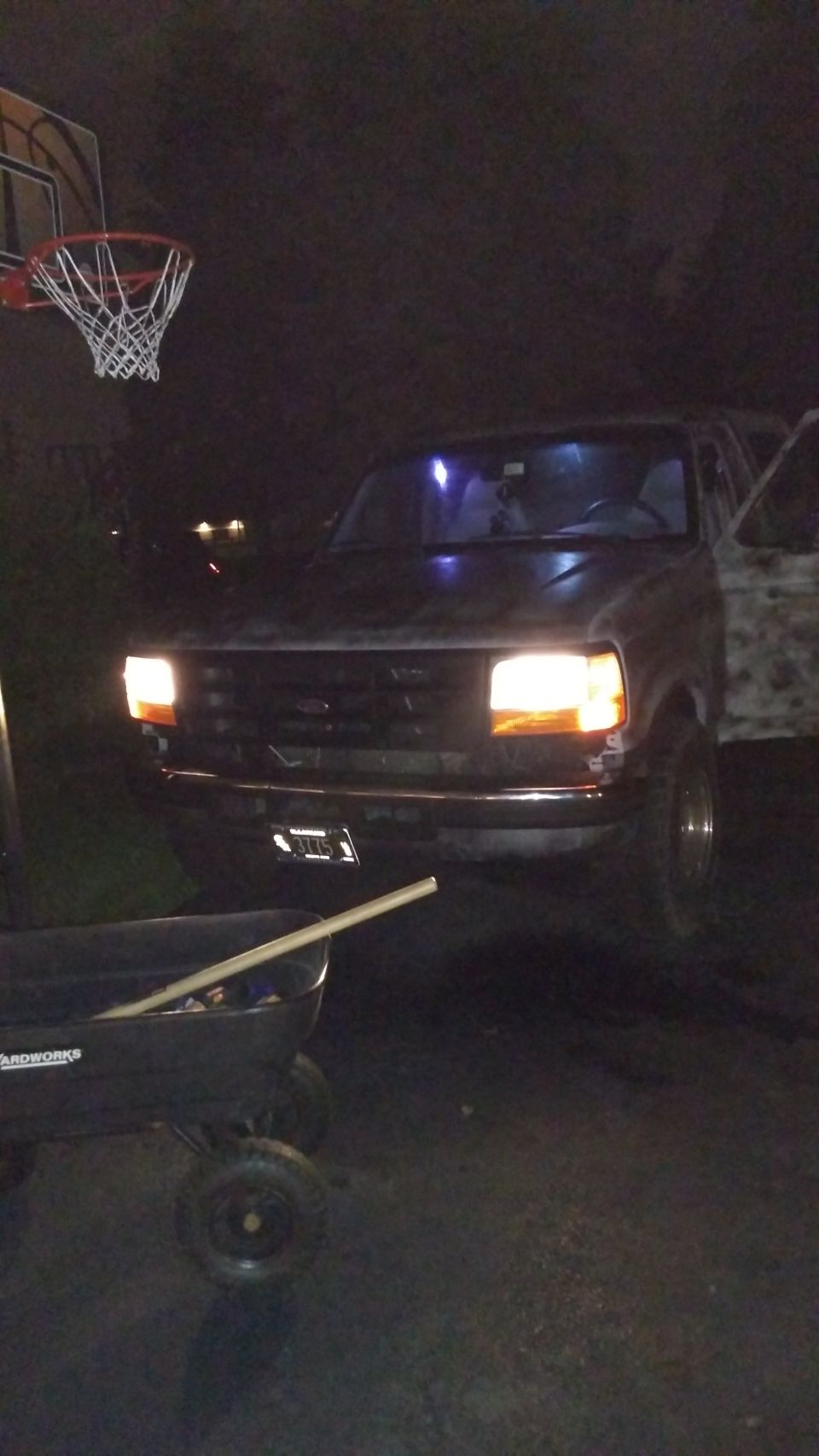 1996 Ford Bronco front view at night