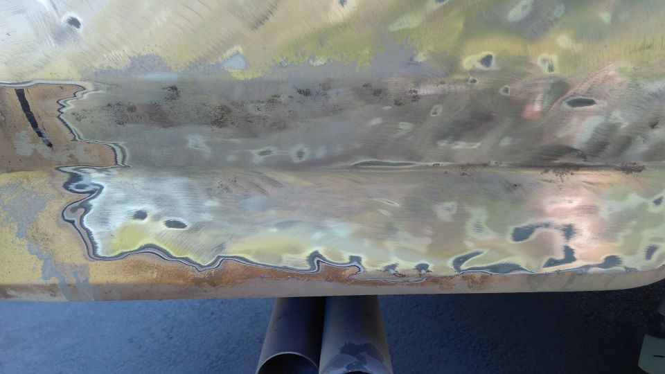 Just as I thought I was getting out of the panel replacement stage, I found more rust. Another FID (ford-ingenious-design) of 1996. Mud would kick up behind this panel and get trapped.