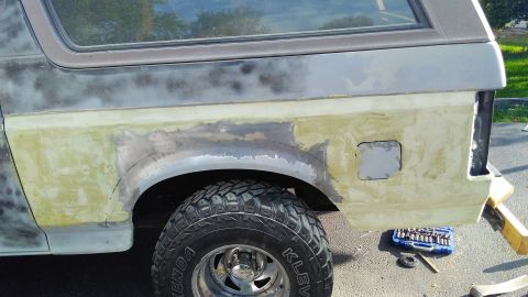 1996 Ford Bronco - No pictures of the replacement panel on, but it came out very nice. Bondo work really going on the rear driver side.