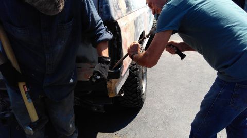 1996 Ford Bronco - Grandpa and dad helped to remove a couple broken bolts reminiscent of the tire carrier. We ended up drilling them out and welding nuts on t…