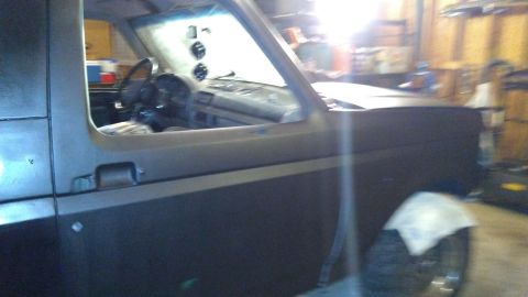 1996 Ford Bronco - The interior of a 1996 Ford Bronco shows added gauges above the dashboard.