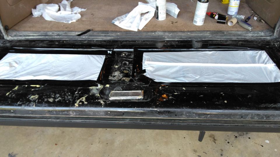 I covered the glass access with a bunch of garbage bags and duct tape to stop water leaking out.