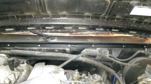 1996 Ford Bronco - Windshield cowl installed, along with new weatherstripping between the cowl and hood.