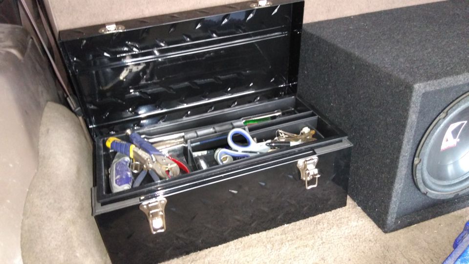 Toolbox is metal, from home depot, cost about $25. I bolted it to the floor.