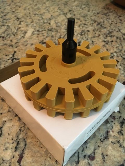 1988 Ford Bronco - This yellow rubber eraser wheel is designed for removing decals and adhesive from vehicle surfaces.