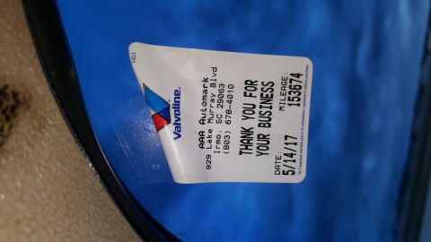 1995 Ford Bronco - A service sticker from AAA Automark shows a date of 5/14/17 and mileage of 153674.