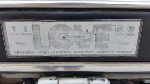 1995 Ford Bronco - This emblem displays multiple GM brands and dealership locations, not a specific vehicle year.