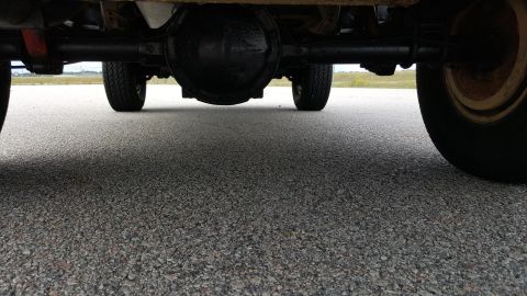 1995 Ford Bronco - Underside view of a vehicle's rear axle and differential.