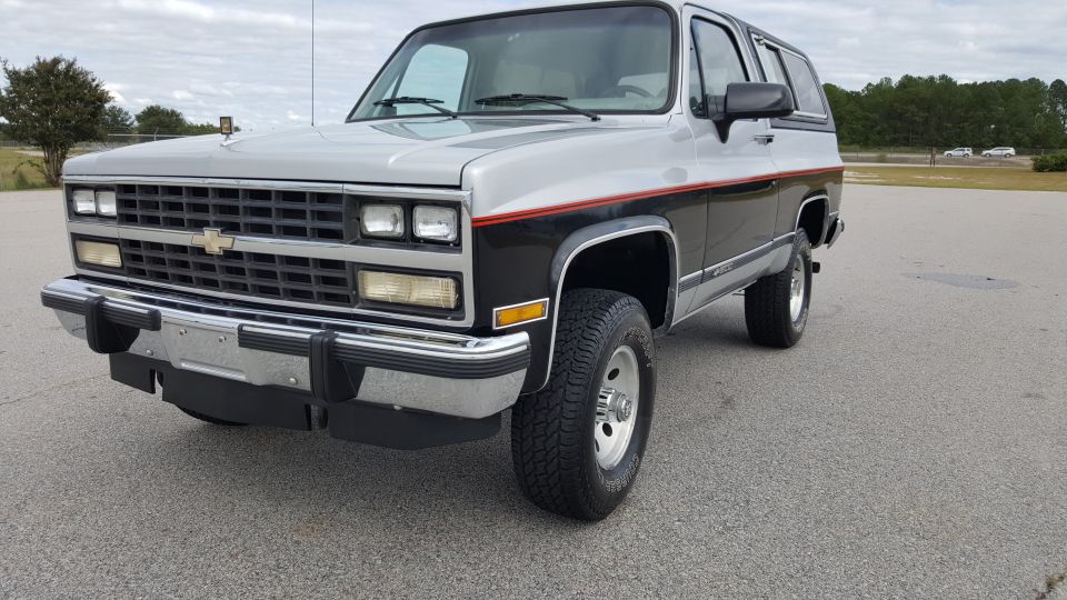 1980 Chevrolet K5 Blazer, two-tone silver and black paint with red pinstripe