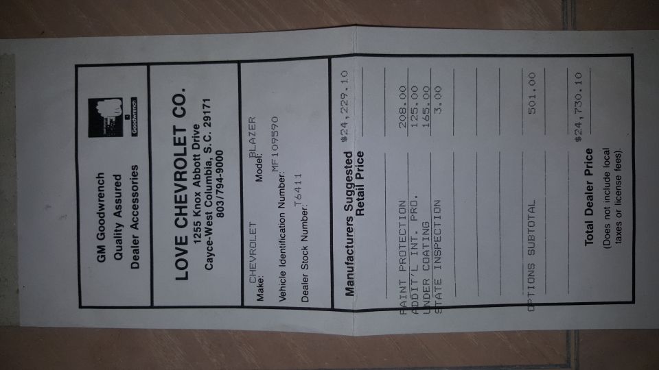 Car invoice from Love Chevrolet Co. listing a Chevrolet Blazer