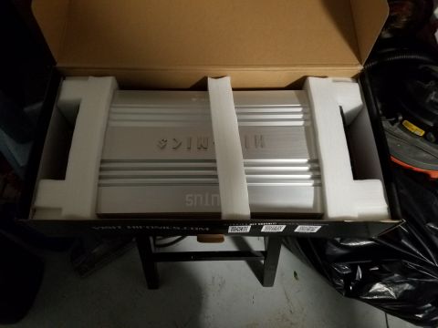 1994 Ford Bronco - Car amplifier in its original packaging, showing brand name and website on the box.