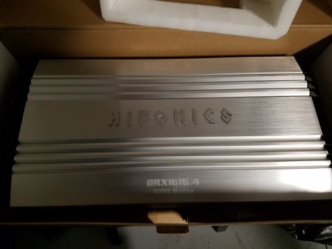 1994 Ford Bronco - A Hifonics car amplifier, model BRX1616.4, is shown in its packaging.