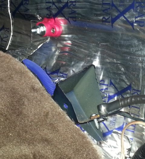 1994 Ford Bronco - Interior view of sound dampening installation with visible wiring and electrical connections.