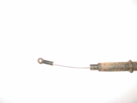 1993 Ford F-150 - Close-up of a cable with an eyelet end, likely a vehicle part.