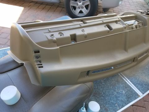 1994 Ford Bronco - Dashboard removed for repair, showing the underside and mounting points.