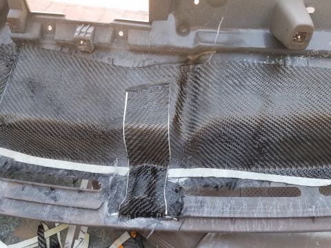 1994 Ford Bronco - Dashboard interior showing a repair with carbon fiber wrap applied.
