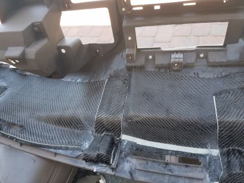 1994 Ford Bronco - Dashboard part being repaired with carbon fiber wrap.