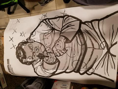 1994 Ford Bronco - This is a target with a drawing of a man holding a gun, not a vehicle.