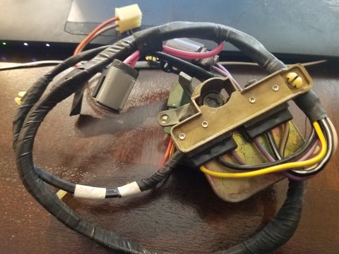 1994 Ford Bronco - Close-up of an automotive wiring harness, showing various connectors and wire colors.