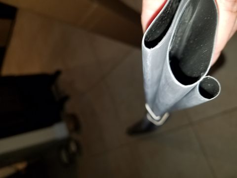 1994 Ford Bronco - Close-up view of dual exhaust tips, one of which is smaller than the other.