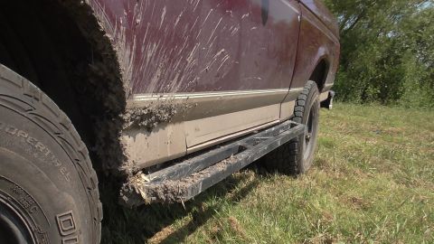1996 Ford Bronco - This 1996 Ford Bronco shows off its running boards covered in mud after an off-road excursion.