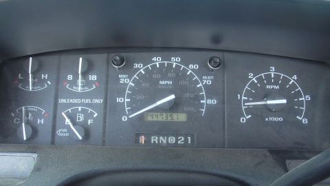 1996 Ford Bronco - Interior view of a vehicle's dashboard gauges, including the speedometer and odometer.