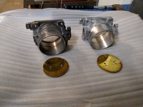 1995 Mercury Grand Marquis - Comparison of a used and a freshly cleaned Ford throttle body with brass plates.