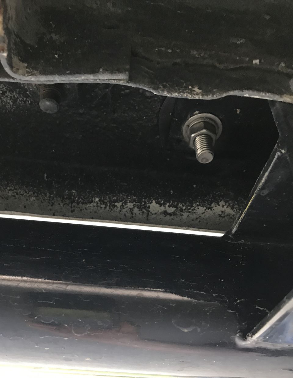 Undercarriage bolt and frame detail