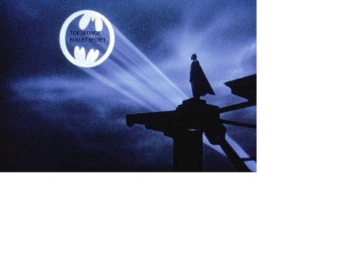 1995 Mercury Grand Marquis - The iconic Bat-signal illuminates the night sky, a call for the caped crusader.