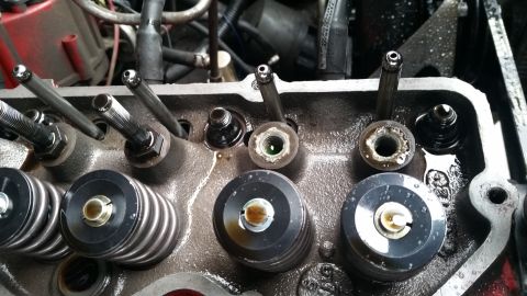 1981 Ford Bronco - Engine valve train components, including springs, retainers, and pushrods, are visible in this close-up.