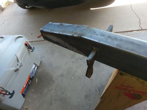 1988 Ford Bronco - Custom metal bumper part is shown on sawhorses, with a toolbox nearby.