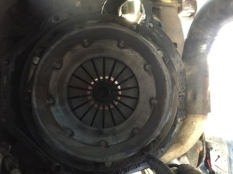 1986 Ford Bronco - This image shows a vehicle's clutch assembly, likely during maintenance or repair.